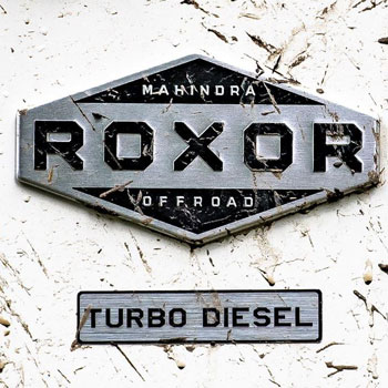 ROXOR badge with mud.